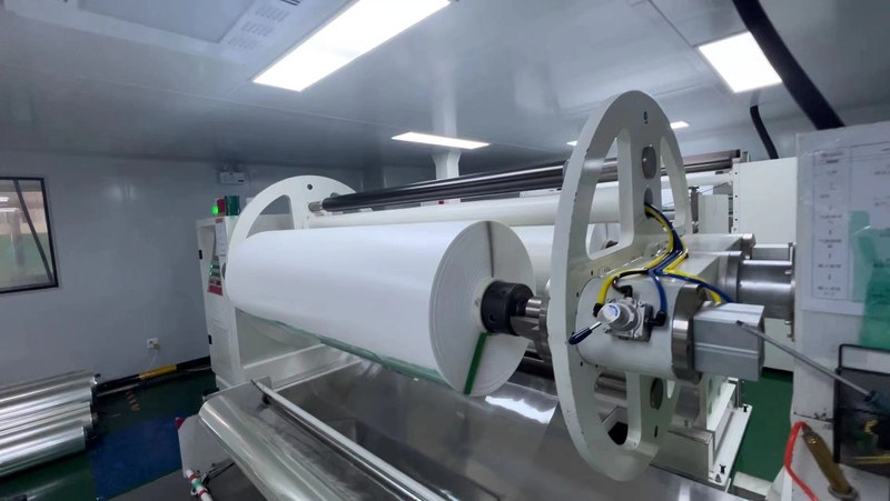 dyed carbon ceramic window tint 03 white PET roll on the production machine used to make dyed carbon and ceramic window tint