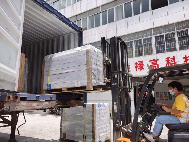 Container loading of OEM and white label window film orders at KSB factory in Guangzhou Container loading of OEM and white label window film orders at KSB factory in Guangzhou