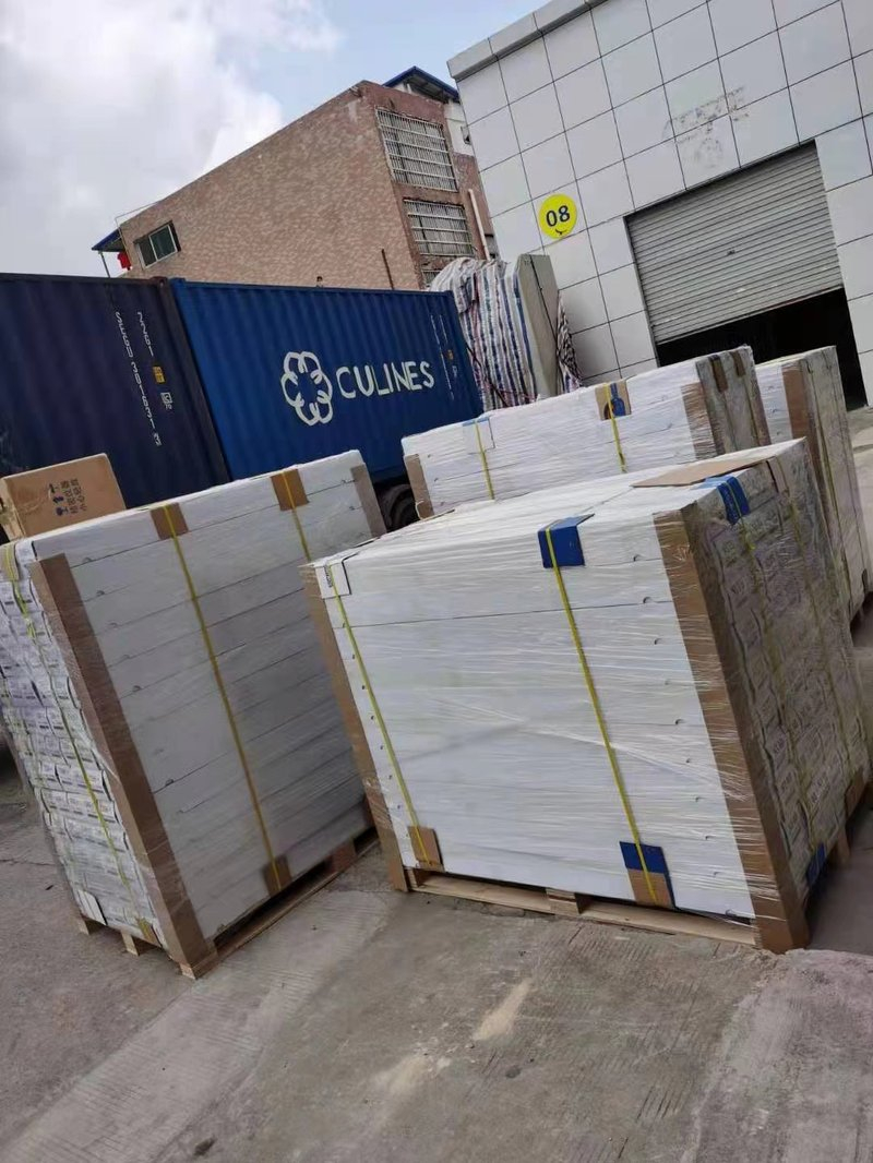 Pallets of window film cartons loaded into a shipping container for a 300-roll export order Pallets of window film cartons loaded into a shipping container for export