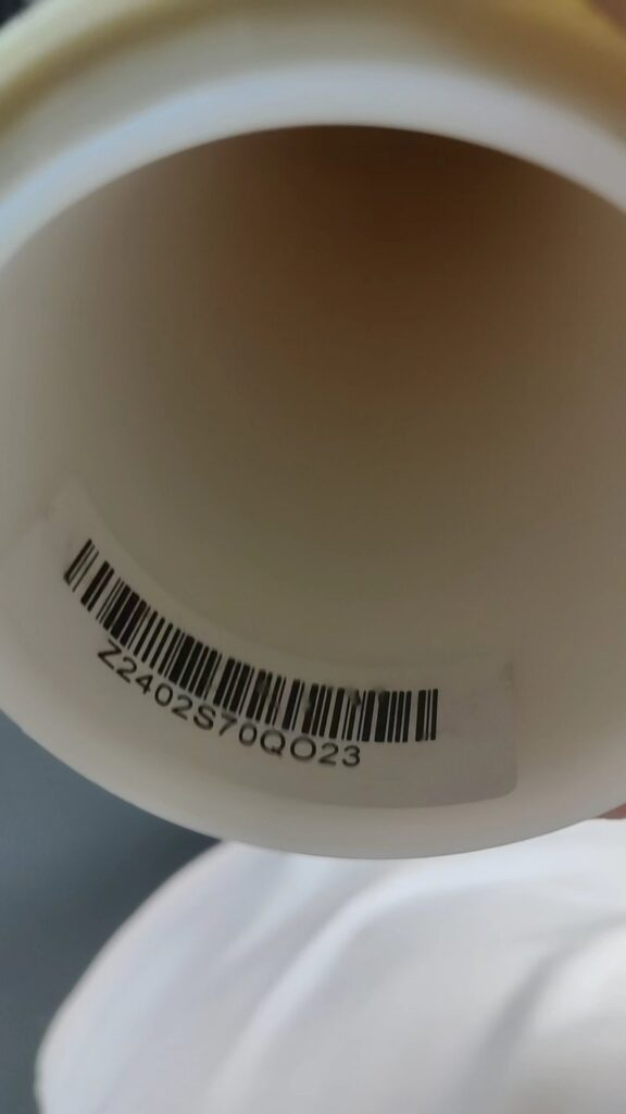 Batch code label on a window film roll core for traceability against the window film spec sheet